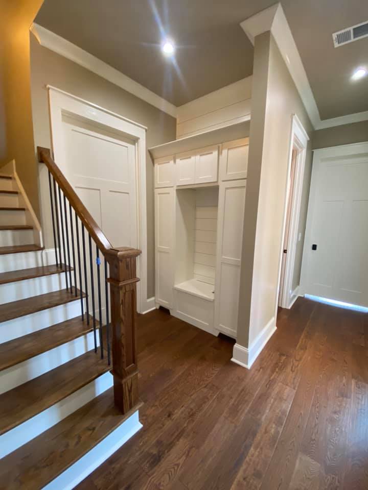 Photo of mudroom storage built ins and staircase to 2nd floor